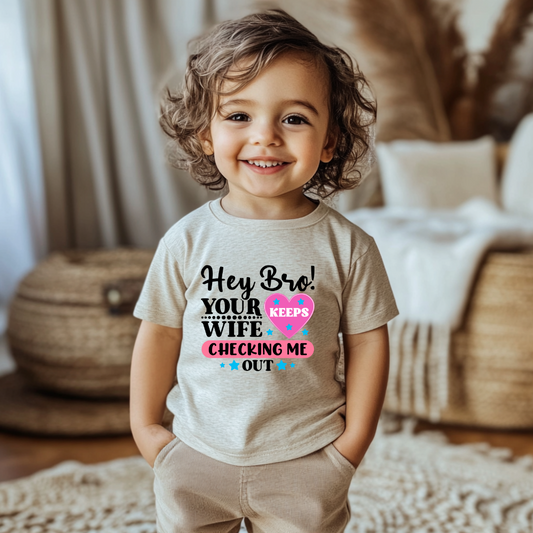 Playful Infant Tee - "Hey Bro! Your Wife Keeps Checking Me Out" Funny Baby Shirt, Fun Gift for New Parents, Birthday, Baby Shower, [...]